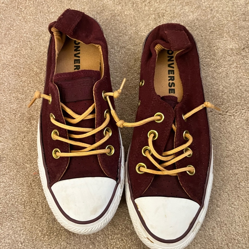 Maroon low top converse sneakers